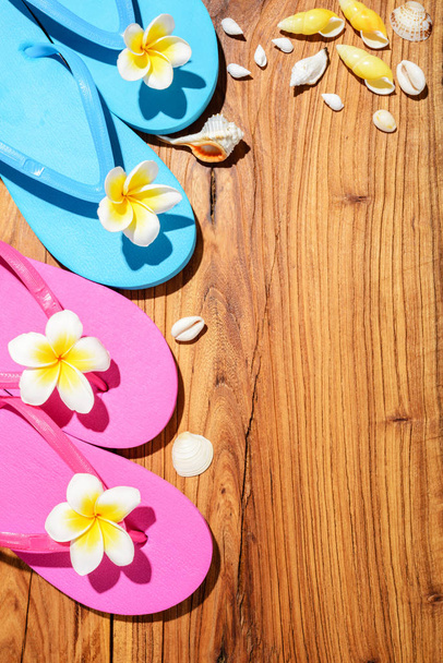 colorful flip-flops on the wooden board - Φωτογραφία, εικόνα