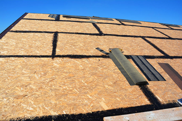 Roof shingles - roofing construction, house roofing repair with asphalt shingles - Photo, Image