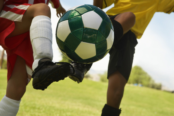 Football Player Tackling Soccer Ball - Photo, Image