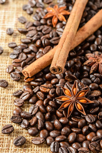 coffee beans and  cinnamon sticks - Fotó, kép