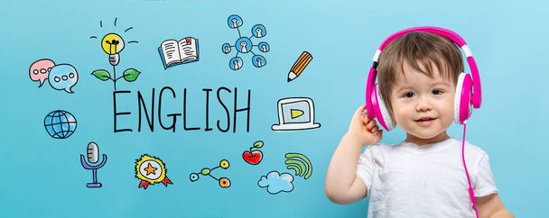 English with toddler boy with headphones - Foto, immagini