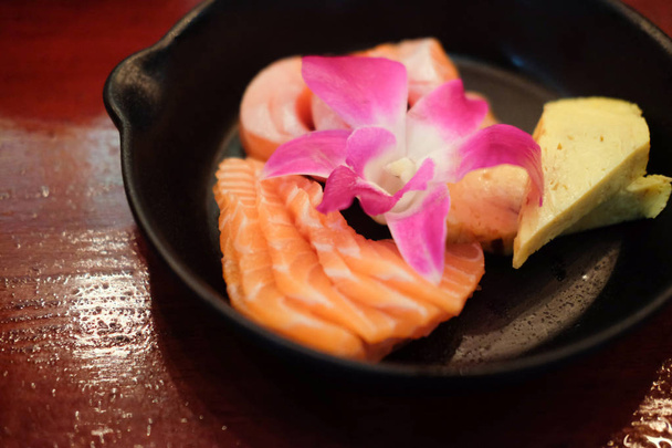 Japanese food delicacy consisting sashimi salmon of very fresh raw salmon fish sliced - Photo, Image