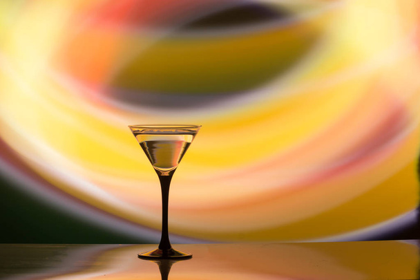 colourful cocktail on the club light background. Party club entertainment. Mixed light - Photo, Image