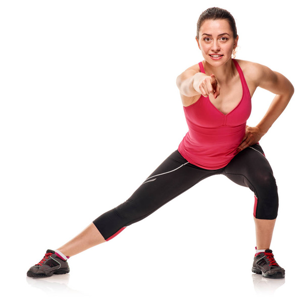 Sporty pretty woman exercising - Photo, Image