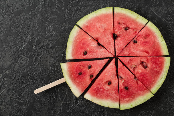Watermelon Slice and Mint on Dark Stone Table. Summer Background. Top View Flat Lay. Copy Space For Your Text - Foto, immagini