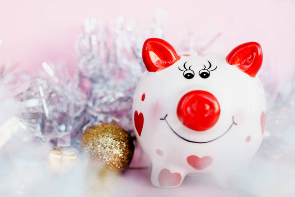 Piggy bank over pink background. Year of pig 2019. - Photo, Image