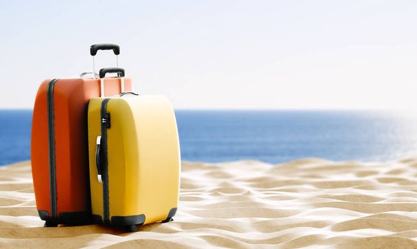 travel theme background with colorful luggage on sand - Photo, Image
