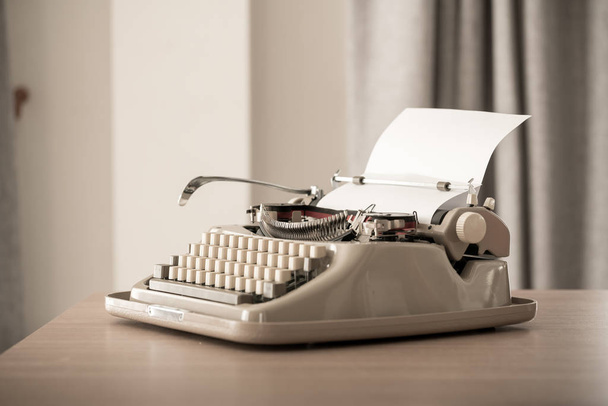 Retro style typewriter in studio - Fotó, kép