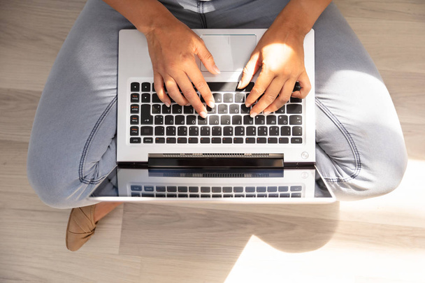 High Angle View Of A Woman's Hand Typing On Laptop Keypad - Valokuva, kuva