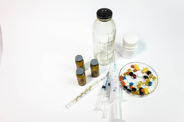 Colorful medical pills and bottles, medicine and healthcare concept  - Photo, image