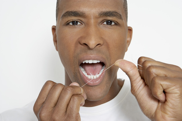 Man Flossing Teeth - Fotoğraf, Görsel
