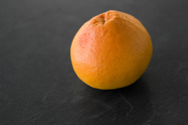 close up of fresh grapefruit - Фото, зображення