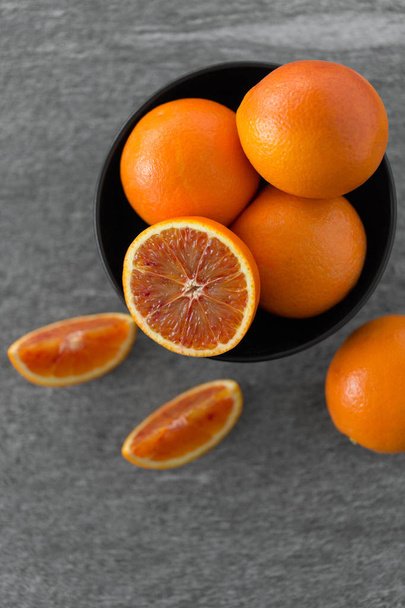 close up of fresh juicy blood oranges - Foto, Imagen