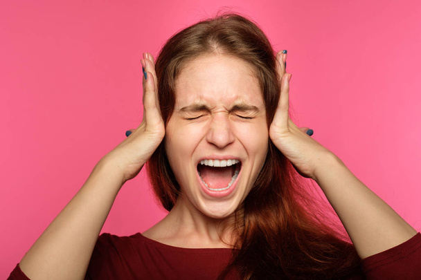 rejection refusal hear woman cover ears screaming - Фото, изображение