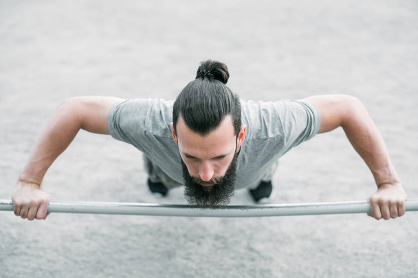 wide grip bar push up sport fitness man exercising - Φωτογραφία, εικόνα