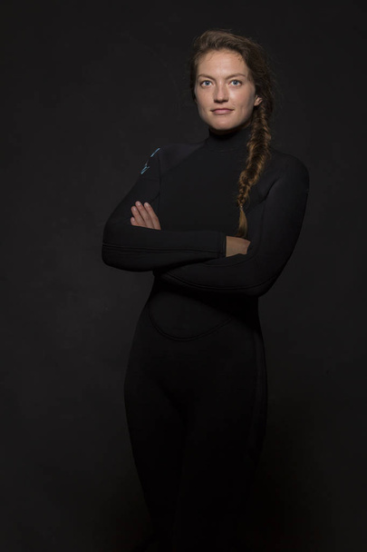 beautiful young woman in diving suit  - Zdjęcie, obraz