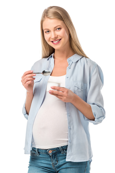 Lächeln schwangere Frau mit Joghurt isoliert auf weiß - Foto, Bild