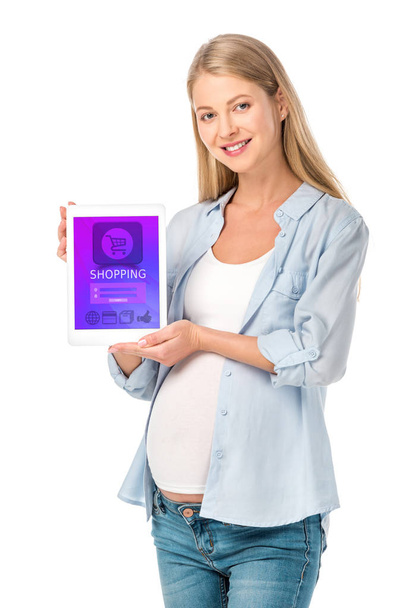 mulher grávida sorrindo mostrando tablet digital com aparelho de compras isolado em branco
 - Foto, Imagem