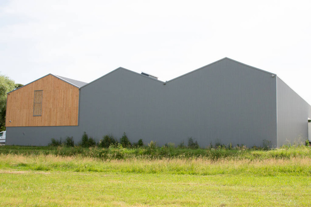 rear view of a company headquarters with a warehouse and offices - Foto, immagini