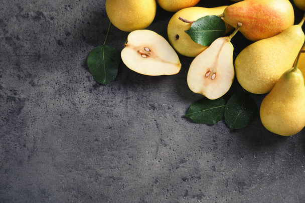 Ripe pears on grey background, top view. Space for text - Photo, image