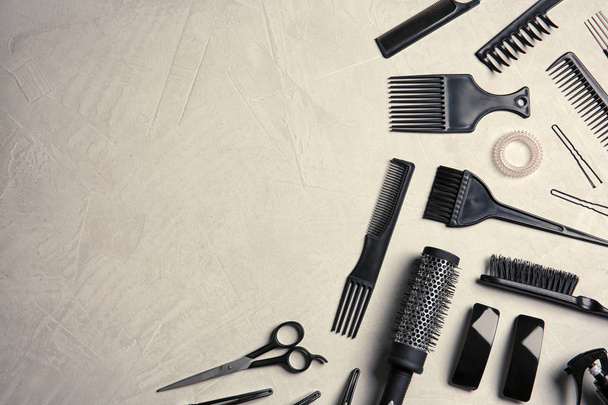 Flat lay composition with hairdresser tools on color background. Space for text - Zdjęcie, obraz