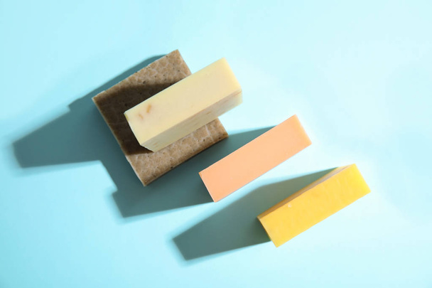 Hand made soap bars on color background, top view - Фото, зображення