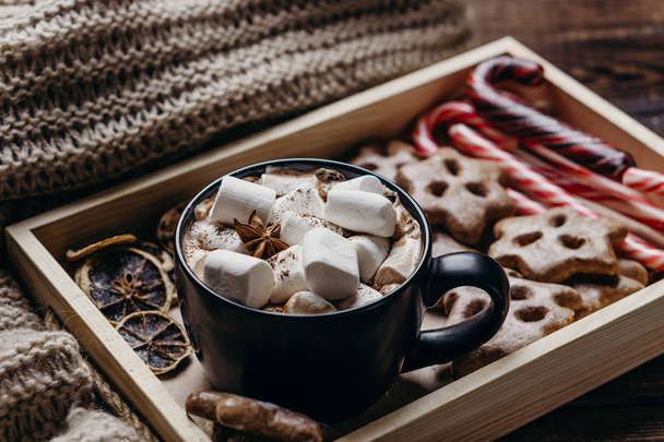 Christmas background with hot chocolate and sweets - Foto, Bild