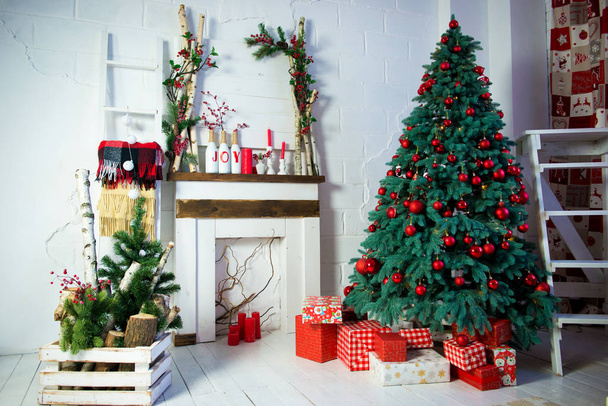 Christmas and New Year decorated interior room with presents and New year tree. - Foto, imagen