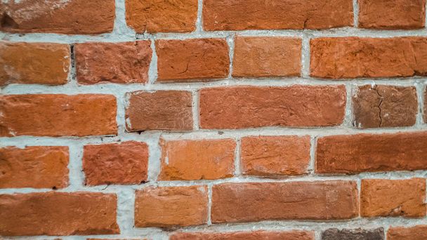Wall of old red brick with white cement. Brick texture background - Valokuva, kuva