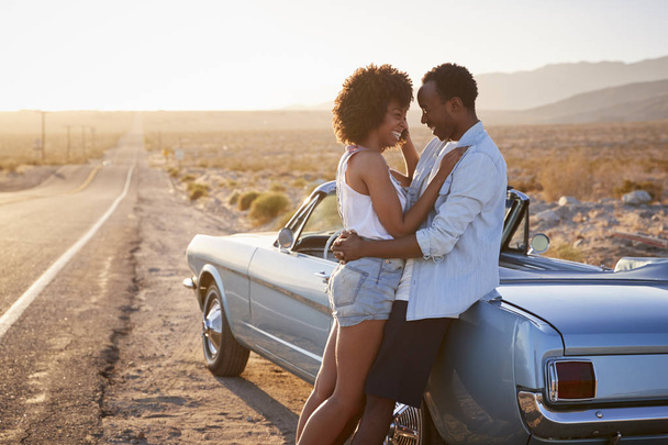 Romantic Couple Enjoying Road Trip In Classic Car - Foto, immagini