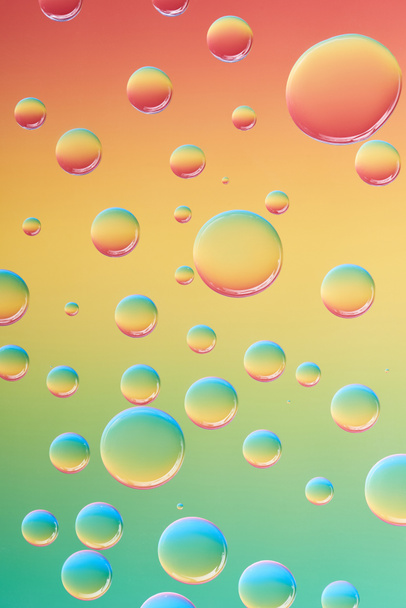 close-up view of beautiful calm transparent water drops on bright abstract background - Foto, immagini