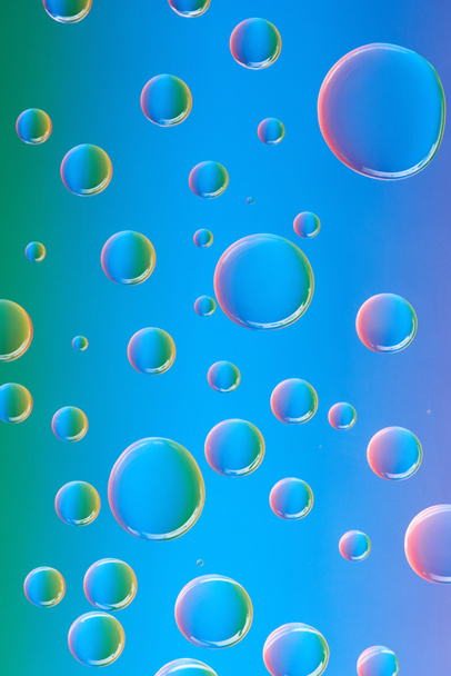 close-up view of beautiful calm transparent water drops on abstract background - Valokuva, kuva
