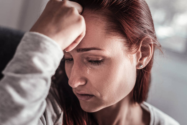 Portrait of an unhappy crying woman - Fotografie, Obrázek