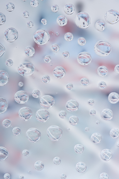 beautiful transparent rain drops on blurred abstract background  - Zdjęcie, obraz