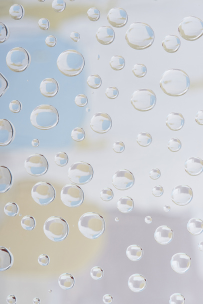beautiful transparent droplets on blurred abstract background  - Foto, Imagem