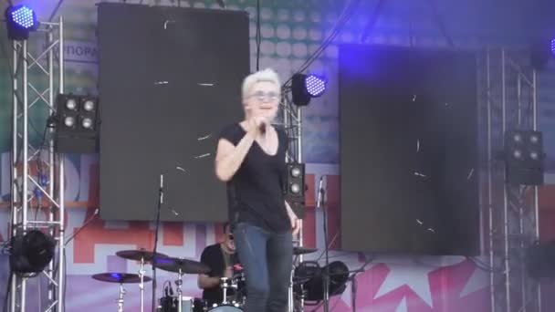 Beautiful blonde sings and dances. Sexy girl, Singer at the concert. sings at the festival. from drive dancing girl with microphone . Russia Berezniki 14 July 2018 . - Filmmaterial, Video