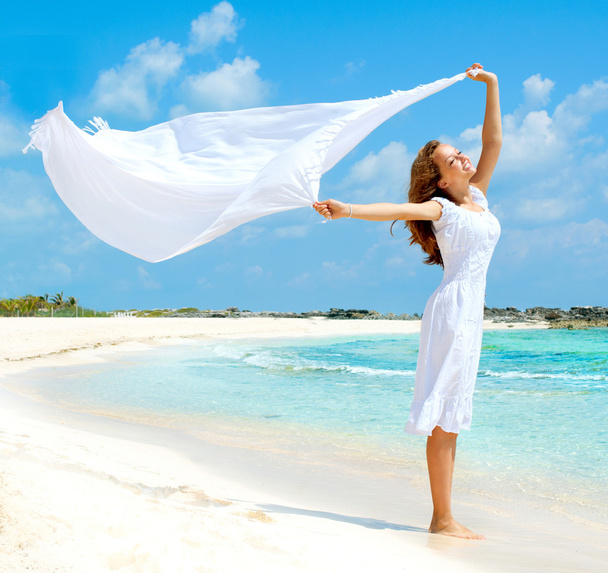 Beautiful Girl With White Scarf on The Beach - Photo, image