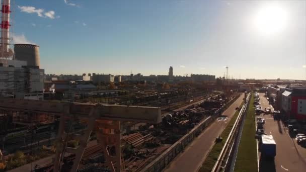 The urban landscape and the territory of the factory, production. Logistics center in industrial city zone from above - Footage, Video