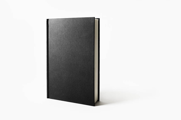 Mockup of closed blank black book on white paper background. - Φωτογραφία, εικόνα