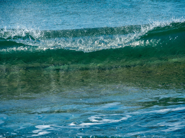 Close-up of a small waves on the sea, Crete island, Greece - Photo, Image