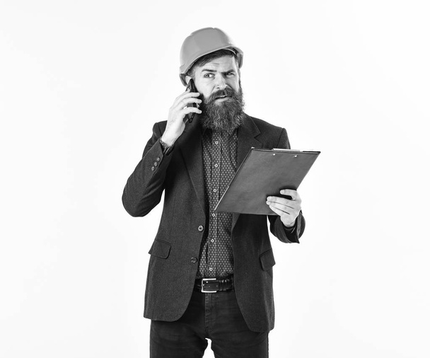 Mobile phone concept. Project manager with long beard talking on mobile phone - Fotoğraf, Görsel