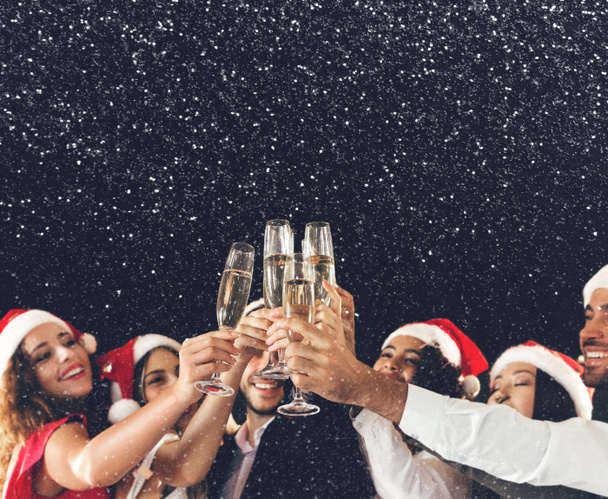 Champagne glasses in people hands at New Year - Photo, Image