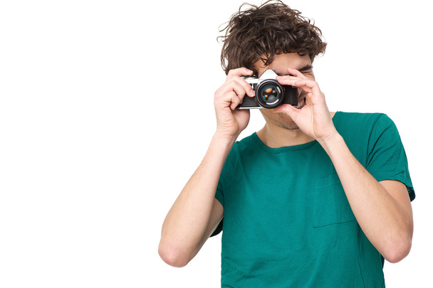 Young Man Taking Picture with Camera - Valokuva, kuva