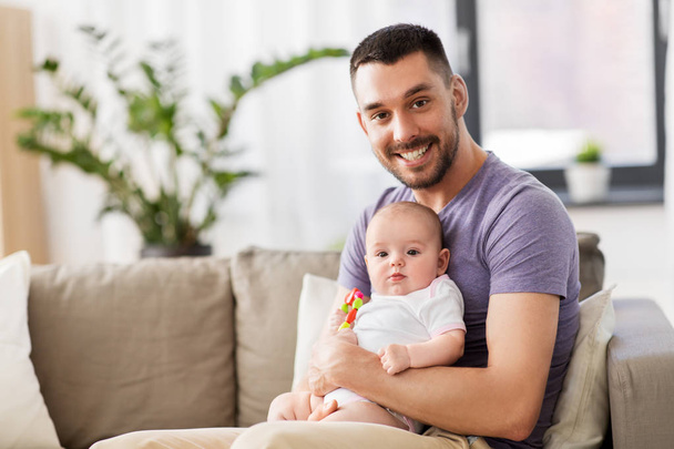 happy father with little baby daughter at home - Photo, Image