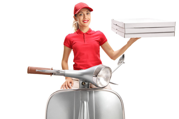 Pizza delivery woman on a motorbike isolated on white background - Фото, зображення