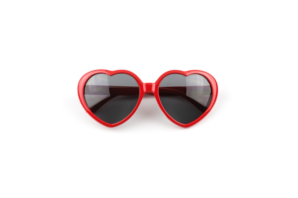 Red heart shaped sunglasses isolated on white background, summer holidays  - Photo, Image