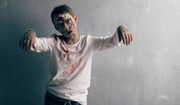 Dead boy zombie. Horror halloween concept. - Фото, изображение
