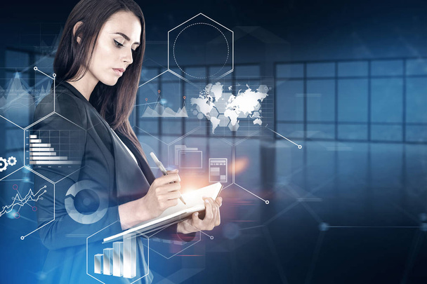 Businesswoman with planner in empty office. Infographics interface foreground. Toned image double exposure. Elements of this image furnished by NASA - Foto, Bild