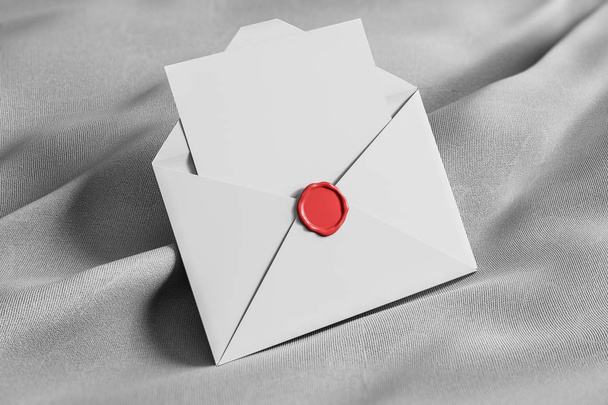 Open white envelope with blank sheet of paper and gray stamp lying on red tissue. Communication concept. 3d rendering mock up - Фото, изображение