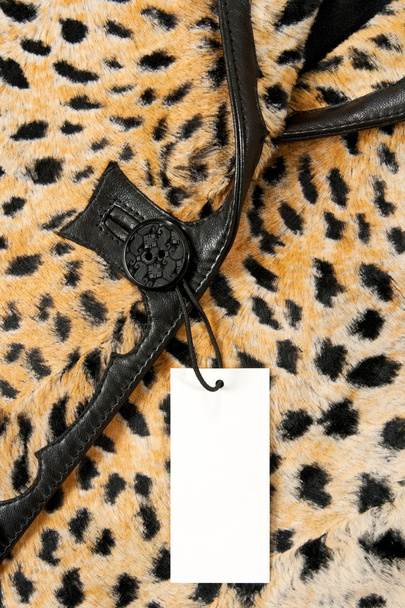 Blank label on a stylish leopard jacket - Photo, Image